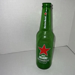 Collector Man, Cave Beer Bottle Heineken bottle Empty 9” Miami, Florida - Picture 1 of 3