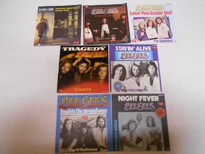 The Bee Gees + Solo- 7 verschiedene Single Cover - Neu - Bild 1 von 2