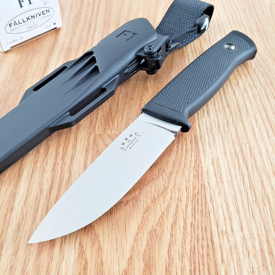 Cuchillo fijo Fallkniven F1 hoja de acero satinado Elmax mango negro Thermorun Foto 1 de 4