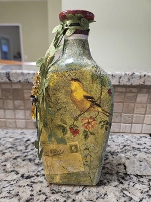Botella de vidrio decorativa de pinzón dorado hecha a mano Foto 1 de 3