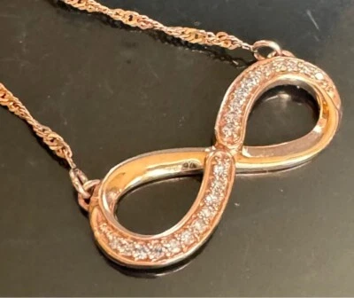 COLLAR INFINITO ORO ROSA Y DIAMANTES Foto 1 de 4