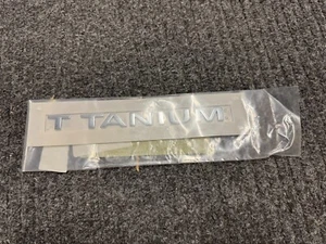Ford Titanium Rear Tailgate Badge Emblem Genuine OEM 1805527 - Picture 1 of 4