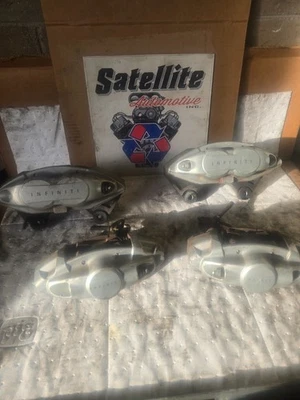 INFINITI NISSAN 2007-2024 OEM FRONT REAR LEFT RIGHT AKEBONO BRAKES CALIPERS - Image 1 of 4