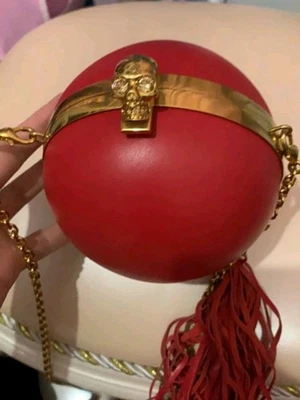 ($2,305 Retail) Rare Alexander McQueen Nappa Sphere Skull Clutch Red. - Image 1 of 4