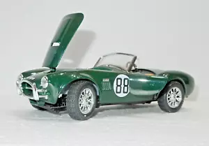 BURAGO 1:24 AC COBRA BRITISH RACING GREEN DIECAST SPORTS CAR - Picture 1 of 8