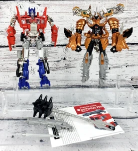 Platinum Edition: OPTIMUS PRIME & GRIMLOCK Transformers AOE Evasion Hasbro - Picture 1 of 10