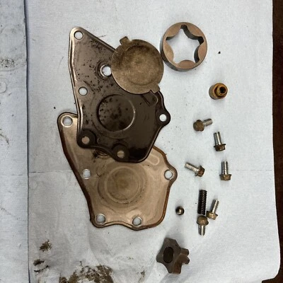 1990’s Club Car Gas Golf Cart DS FE290  Motor  Left Hand Motor Oil Pump Assy - Image 1 of 2