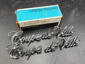74 75 76 Cadillac Coupe deVille Quarter Panel Script Nameplate Emblem Set NOS - Picture 1 of 2