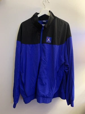 Nike Air Jordan Tinker Legacy windbreaker jacket in a black and blue - Imagem 1 de 4