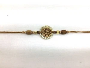 Traditional Aum design & wooden beading-Rakhi Thread/Rakhi Bracelet/BhaiyaSeries - Picture 1 of 1