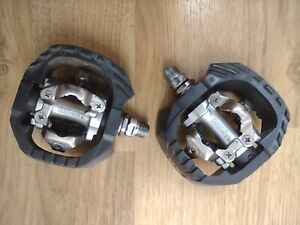 Shimano XL M647 SPD  clipless Pedals black and silver. Clean and hardly used. 