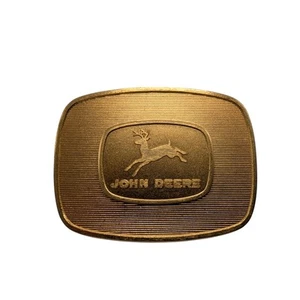 John Deere 1956 logotipo histórico de marca registrada 4 patas ciervo hebilla de cinturón 1986 24kt nuevo - Imagen 1 de 12