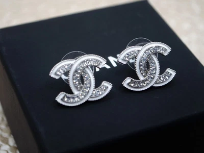 Chanel REV Silver Transparent Crystal CC Logo Classic Statement Stud  Earrings - Image 1 of 4