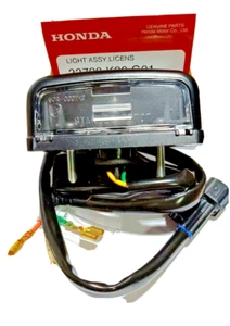 HONDA 2021-24 NEW GROM REAR LICENS PLATE NUMBER LIGHT UNIT ASSEMBLY GENUINE PART - Picture 1 of 13