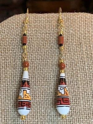 Venta de vacaciones*35% de descuento *PENDIENTES DE CUENTAS DE CERÁMICA Y JASPE ROJO HECHOS A MANO/PINTADOS.-NUEVOS Foto 1 de 4