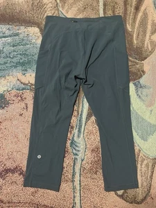 Lululemon Speed Up Crop Luxtreme Side Pockets Size 8 Dark Olive - Picture 1 of 4