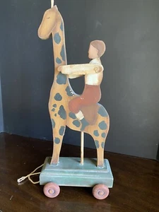 Vintage Giraffe on Wheels Folk Art Polychrome Wood Rolling Toy w/Rider - Picture 1 of 3