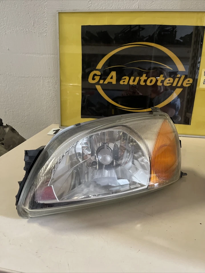 Ford Fiesta JAS JBS original Scheinwerfer links A0301173301 YS6113006EC - Bild 1 von 4