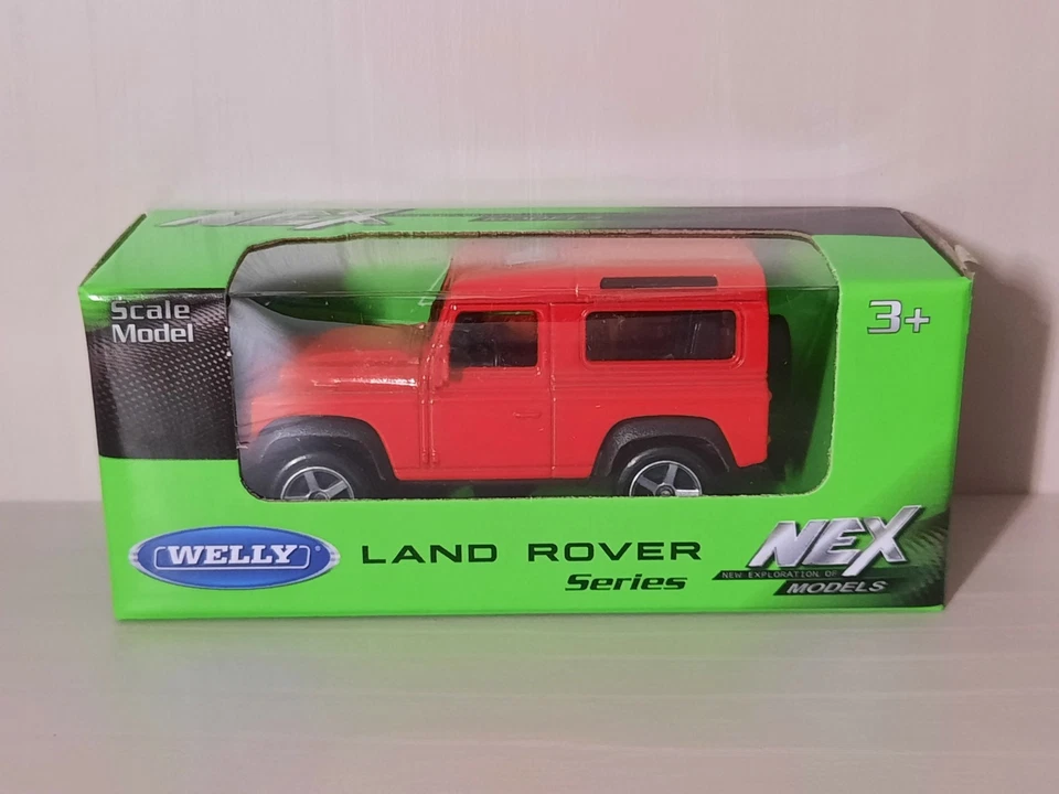 Modellino Statico Land Rover Defender Welly Auto Colore Rosso Scala 1:64 - Immagine 1 di 1