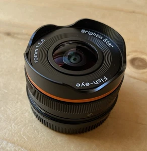 Lente gran angular ojo de pez Brightin Star 10 mm F5,6 MF ajuste mft, con caja original - Imagen 1 de 7
