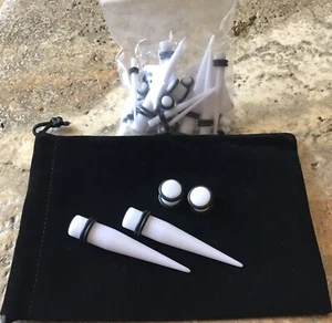 Kit de estiramiento de pendientes con calibre de oreja blanco y transparente - Imagen 1 de 6