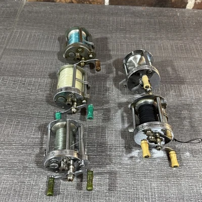 Lote de 5 carretes de pesca - 3 Akron 1893 / 1893L y 2 Trump 1943 Foto 1 de 4