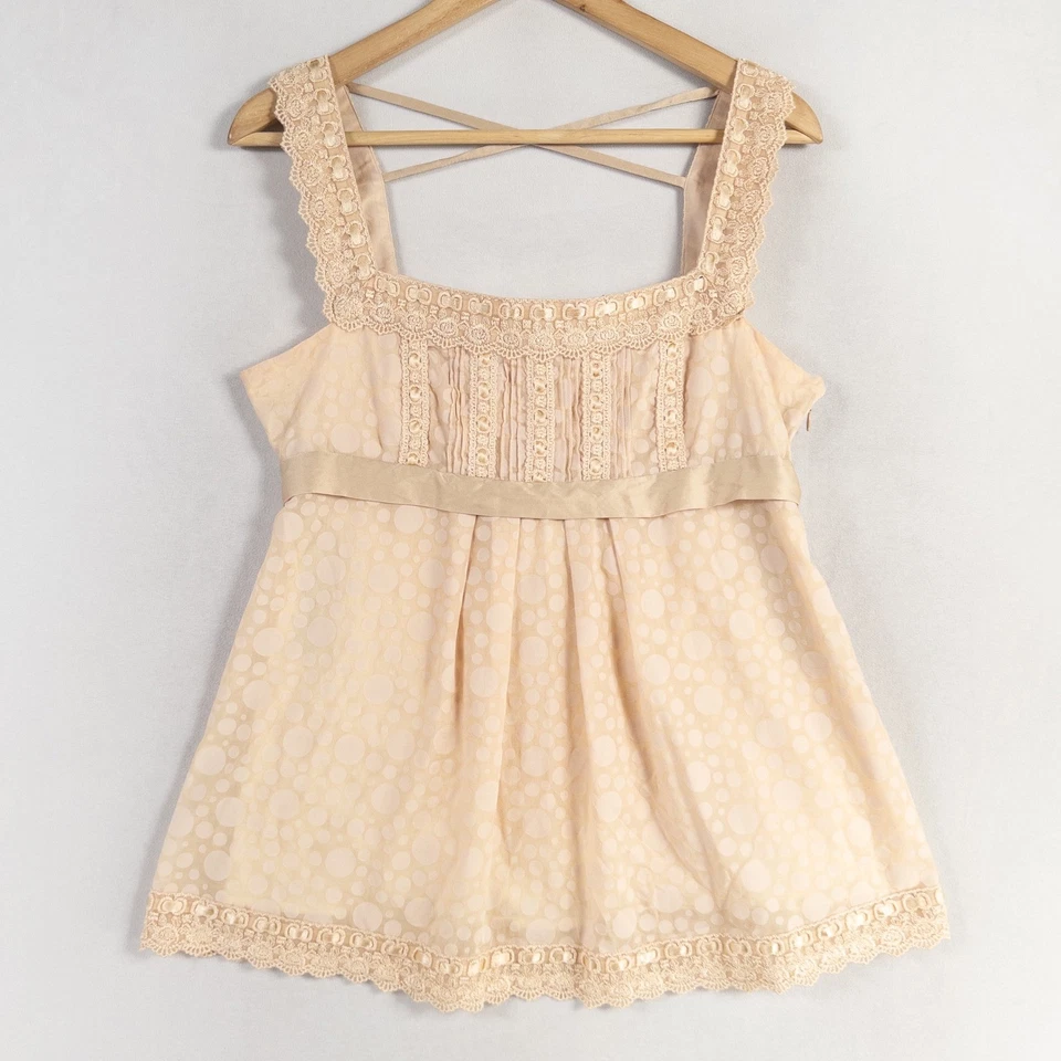 Camiseta sin mangas Bebe para mujer mediana beige estampado circular ribete de encaje Y2K Babydoll romántico Foto 1 de 4