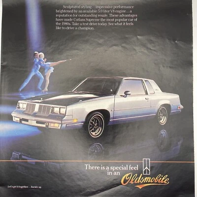 1985 Oldsmobile Cutlass Supreme PRINT AD Olds Champion Performs Ice Skaters - Image 1 of 3