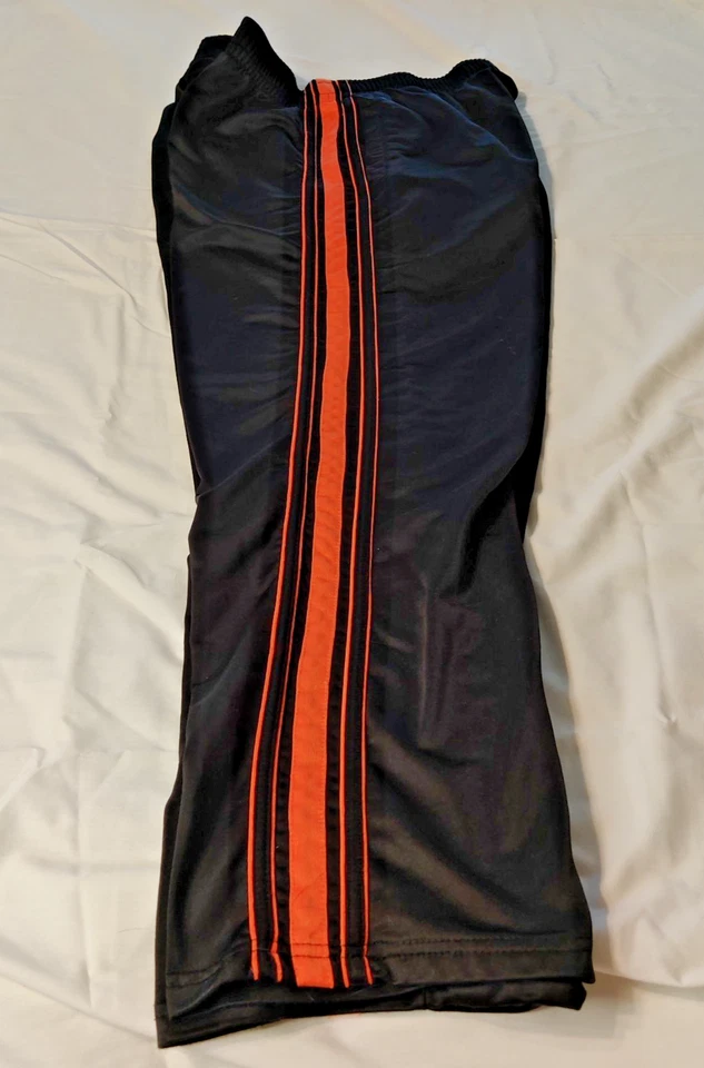 Pantalones deportivos NBN Gear a rayas negras y naranjas para hombre talla XXL Foto 1 de 4