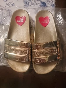 Love Moschino Womens Puffy Gold Shiny Sandals Slides Size 5 US 35 EUR - Picture 1 of 12