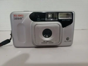 Cámara fotográfica Bell Howell Power Zoom 1000 plateada 35 mm con batería NUEVA *PROBADA CON PELÍCULA - Imagen 1 de 7