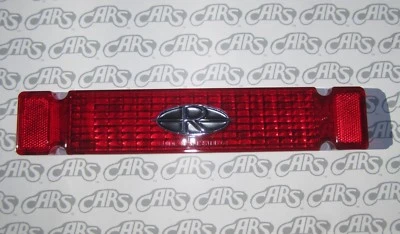 Lente de luz trasera Buick Riviera 1964 con emblema. GUÍA.  OEM #5955242A Foto 1 de 4