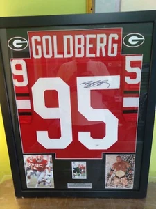 MAGLIA INCORNICIATA BILL GOLDBERG FIRMATA AUTO CON CARTA GEORGIA WWF CHAMPION JSA COA - Foto 1 di 4