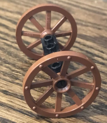Lego 2 brown wagon wheel 4489 & axle  - Image 1 of 4