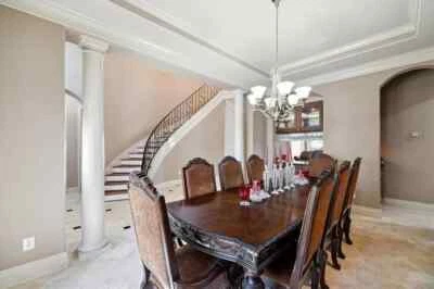 Ashley Furniture North Shore Dining Set with 8 Upholstered Chairs and 2 Leaves - Image 1 of 2