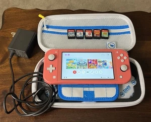 Coral Nintendo Switch Lite w/ 5 Popular Games And A Hard Case & Charger EUC - Picture 1 of 8