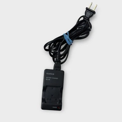CARGADOR DE BATERÍA ORIGINAL FUJIFILM BC-45 OEM - FUNCIONA - 100-240V 4.2V 550mA con cable Foto 1 de 4