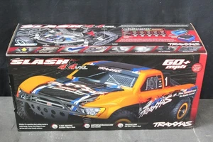 TRAXXAS 68286-4 SLASH 4WD BRUSHLESS VXL 3S SCT  62 - Picture 1 of 4