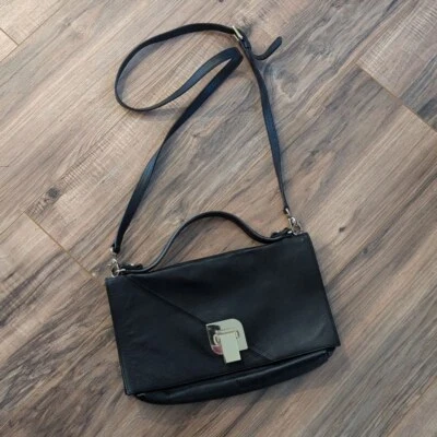 Bandolera italiana de cuero Coccinelle. Bolso Mujer Piel y Gamuza Negro Foto 1 de 4