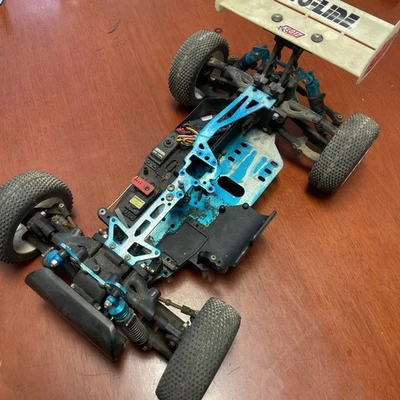 Duratrax Axis 1/8 Nitro Buggy, a type of remote-controlled RC car. - Image 1 of 4