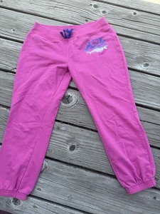 Girls Nike Logo Pink Sweatpants Cuffed Sz L 12-13 Years Cropped - Picture 1 of 3