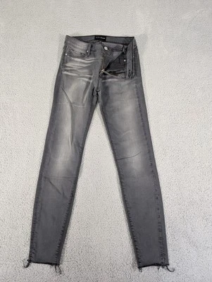 Pantalones de mezclilla elásticos dobladillo crudo ajustados ajustados negros Orchid para mujer 25 grises Foto 1 de 4