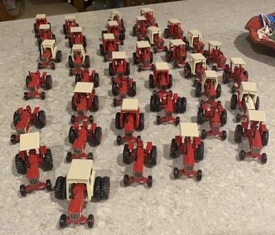Lot of 37 Ertl Case IH Tractors 1/64 Scale Diecast - Image 1 of 4