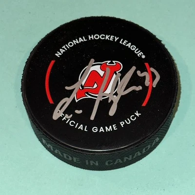 LUKE HUGHES Signed New Jersey DEVILS Official GAME Puck Beckett (BAS) - Image 1 of 3