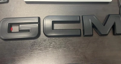 2019-2023 GMC Sierra 1500 2500HD 3500HD Front & Rear Matte Black OVERLAY Emblem - Image 1 of 4