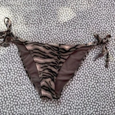 Parte inferior de bikini H&M con estampado animal talla 4 Foto 1 de 3