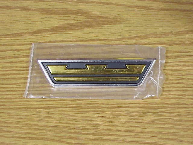 Chrysler Newport 1964 Mopar carrocería trasera emblema puerta gasolina nuevo de stock  Foto 1 de 1