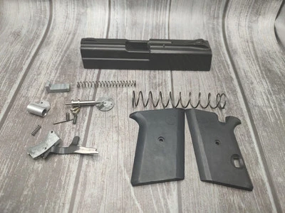 Lote de piezas Kodiak Denali 380 ACP: empuñaduras de gatillo deslizantes completas resorte de retroceso - B Foto 1 de 4