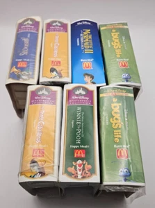 Lot of 7 McDonald’s Happy Meal Mini Disney VHS Clam Shell Toys - Picture 1 of 8