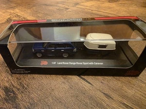 Malibu International Ltd. 1:87 Ho Scale Land Rover Range Rover Sport mit Wohnwagen - Bild 1 von 6